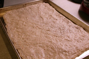 Spread dough in the baking pan.