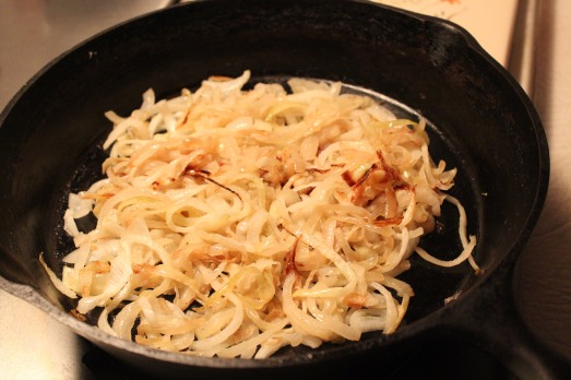 Slowly caramelize the onions until they're fragrant and golden.
