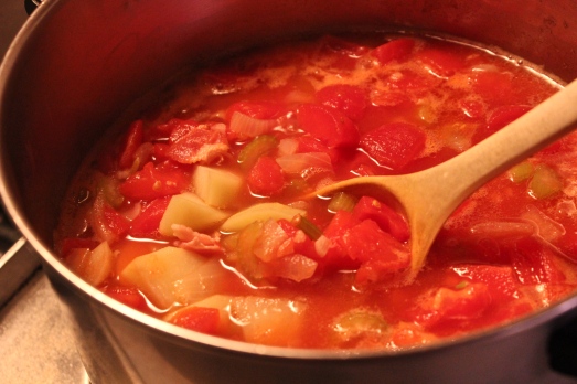 Add broth, potatoes and tomatoes.